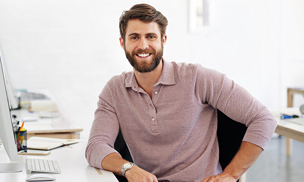 Smiling male AgeSMART senior home safety team member representing certified in-home safety assessments and aging in place support