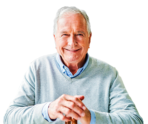 Long distance care for seniors showing an older man smiling at home, representing reassurance and peace of mind