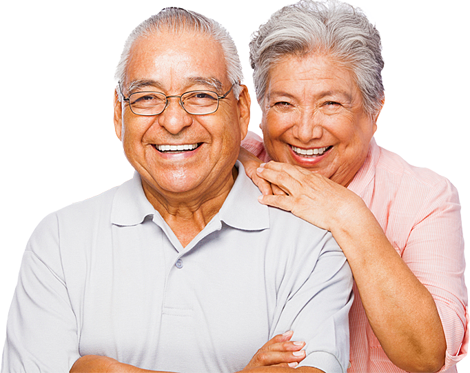Smiling older couple with woman resting her hand on man’s shoulder